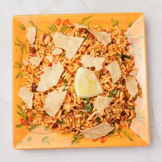 Nepali chatpate street snack — puffed rice, crunchy noodles, chickpeas and fresh vegetables tossed in a tangy spicy dressing