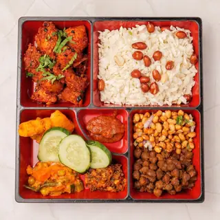 Newari choila samaibaji platter — beaten rice with smoky fire-grilled chicken choila and traditional sides