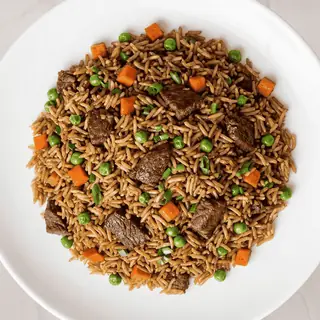 Nepali-style fried rice wok-tossed with fresh mixed vegetables and aromatic spices
